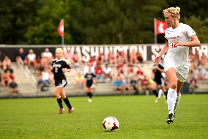 Junior midfielder Nicole Setterlund controls the ball near the touch-line during a game against Eastern Washington on the Lower Soccer Field, Sunday, Sept. 1, 2013.