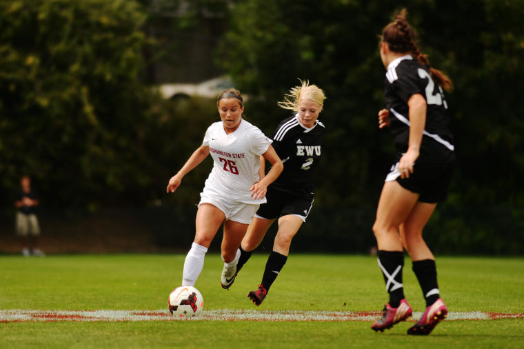 Sophomore midfielder Cara Wegner tries to breakaway from her marker during a match against Eastern Washington Sunday, Sept. 1.