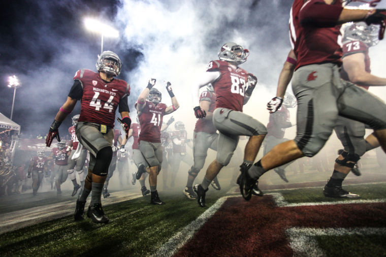 The+WSU+Cougars+exit+the+tunnel+before+a+game+against+Cal+State%2C+Saturday%2C+Oct.+13%2C+2012.