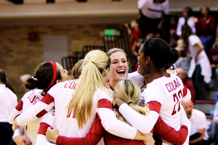 The WSU womens volleyball team celebrate after a scored point against Idaho in Bohler Gym, Thursday, Sept. 19, 2013.