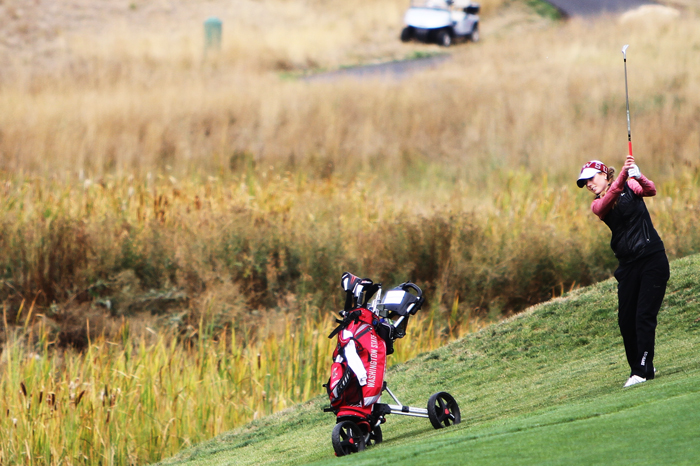 Junior golfer Kristen Rue drives the ball during the Cougar Cup at the Palouse Ridge Golf Club, Monday, Sept. 23, 2013.