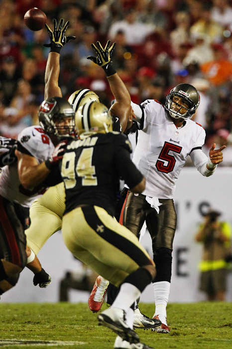 Buccaneers quarterback Josh Freeman throws a pass during a game against the Saints at Raymond James Stadium in Tampa, Fla., Sunday, Sept. 15, 2013.