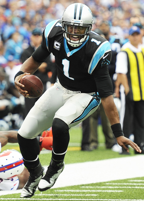 Carolina Panthers quarterback Cam Newton scrambles for yardage against the Buffalo Bills during fourth-quarter action at Ralph Wilson Stadium in Orchard Park, N.Y., Sunday, Sept. 15, 2013.