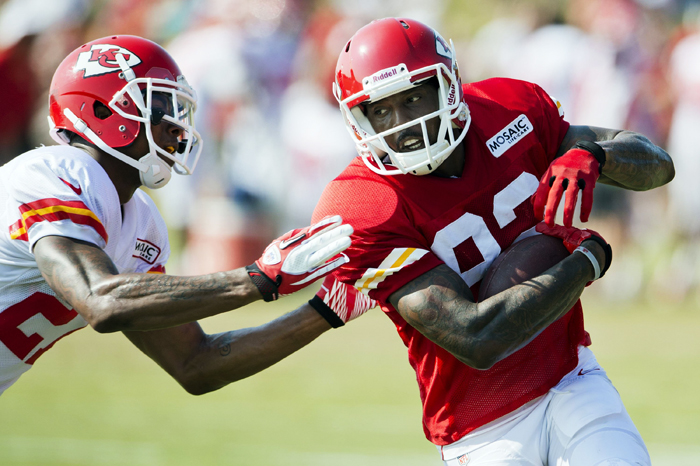 Chiefs wide receiver Dwayne Bowe  runs past Chiefs cornerback Sean Smith during morning practice at Kansas Citys summer training camp at Missouri Western State University in St. Joseph, Miss., Thursday, Aug. 1. 