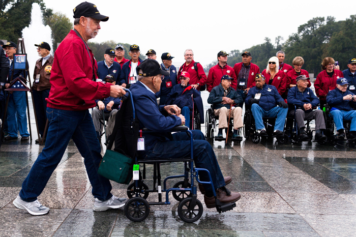 World War II veterans and supporters pose at the World War II Memorial in D.C. on Oct. 30.