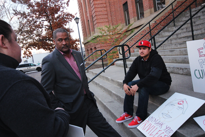 President Elson S. Floyd speaks with protesters at a rally against the Cougador masks in front of Wilson-Short Hall Thursday, Oct. 31.