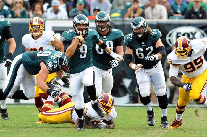 Nick Foles of the Philadelphia Eagles takes off on a 14-yard run in the 1st quarter against the Washington Redskins on Sunday, Nov. 17. at Lincoln Financial Field in Philadelphia.
