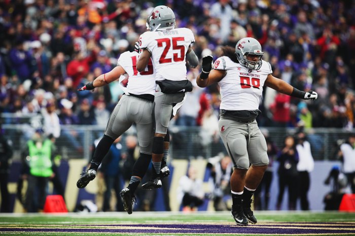 Members+of+the+Cougar+defense+celebrate+after+a+play+during+the+Apple+cup%2C+Friday%2C+Nov.+29.