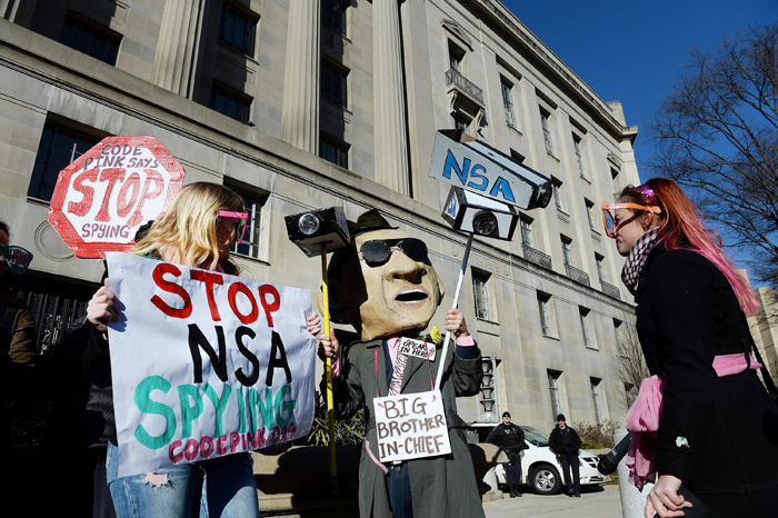 Protesters gather in front of the Department of Justice in Washington D.C., Friday, Jan. 17.