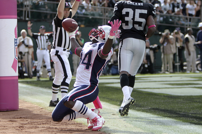 New England Patriots wide receiver Deion Branch celebrates his touchdown against the Oakland Raiders at O.co Coliseum in Oakland, Calif., Sunday, Oct. 2, 2011.