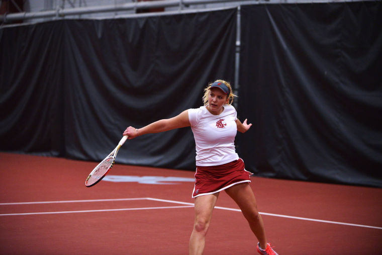 Maria+Biryukova+strikes+the+ball+against+her+University+of+Idaho+opponent%2C+Friday%2C+Jan.+17.