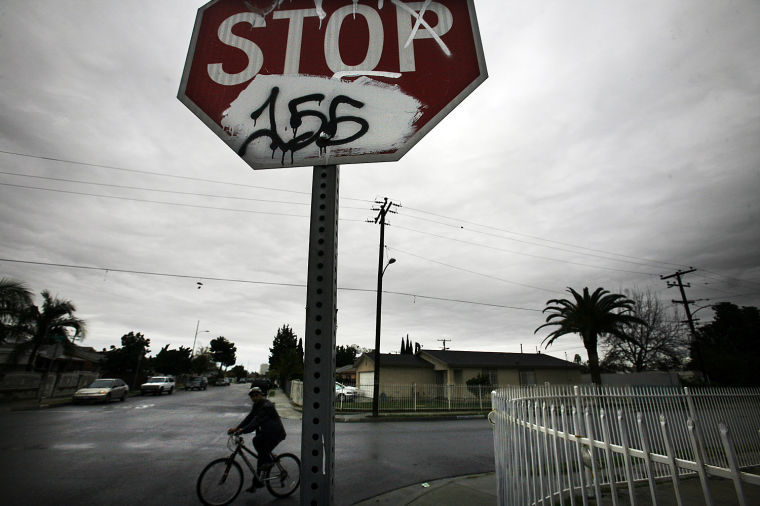 A+graffiti-marred+stop+sign+on+a+street+in+Compton%2C+Calif.%2C+Jan.+25%2C+2013.