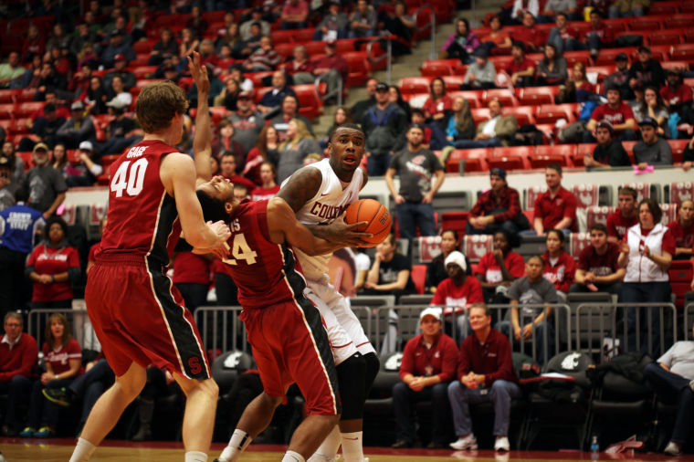 Redshirt+senior+forward+D.J.+Shelton+drives+to+the+hoop+during+a+home+game+against+Stanford%2C+Saturday%2C+Feb.+15.