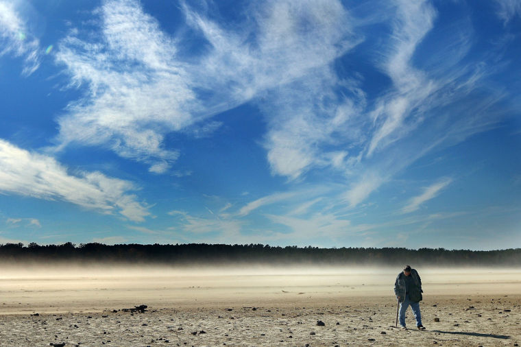 High winds cause a dust storm across the dry lake bed of Falls Lake in North Carolina, Dec. 3, 2007.