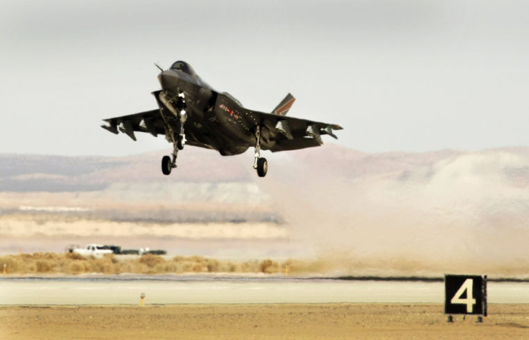 The Lockheed Martin F-35 Lightning II lifts off during testing at Edwards Air Force Base, March 19, 2013.