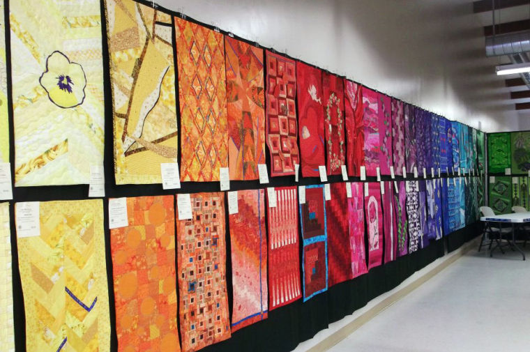 Colored quilts are displayed during the Palouse Patchers Quilt Show, April 14, 2012.