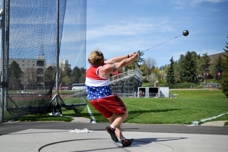 Sophomore Travis Pickett throws during a practice at Mooberry Track, Thursday, May 1.
