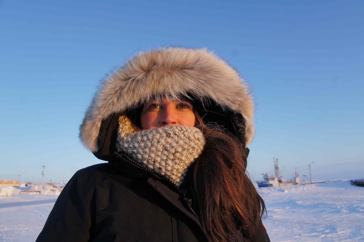 Amanda+Boyd+stands+at+Cambridge+Bay+during+her+research+on+health+communication+with+the+Inuit+peoples.