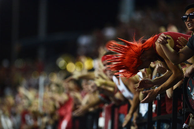 Cougar+fans+cheer+on+the+football+team+in+Martin+Stadium%2C+Sept.+20%2C+2014.
