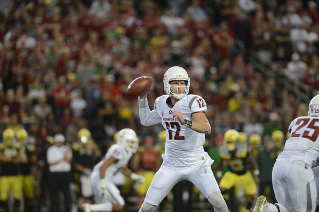 Redshirt senior quarterback Connor Halliday delivers a pass against the Oregon Ducks at Martin Stadium, Sept. 20, 2014.