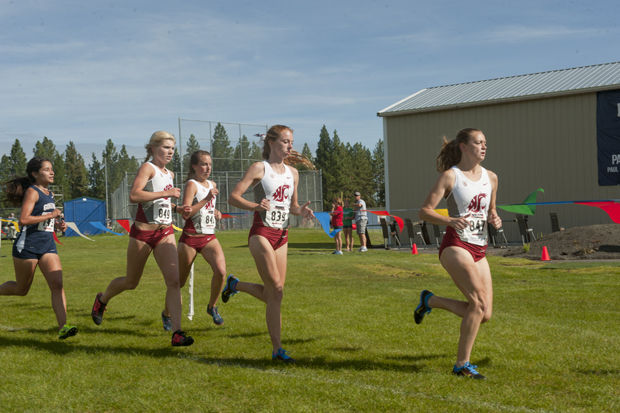 The WSU women’s cross country team runs in the Clash of the Inland Northwest meet in Spokane, Aug. 30, 2014.