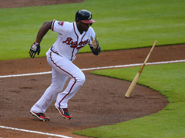 The+Atlanta+Braves+Justin+Upton+tries+in+vain+to+beat+out+a+ground+ball+to+Philadelphia+Phillies+shortstop+Jimmy+Rollins+during+the+first+inning+at+Turner+Field+in+Atlanta%2C+June+17%2C+2014.