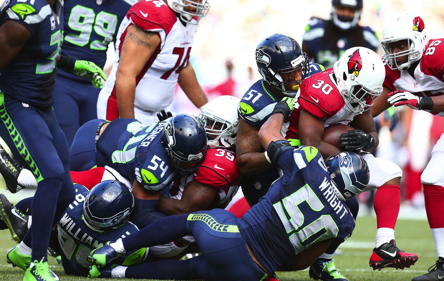 Seahawks+team+up+to+bring+down+Cardinal+running+back+Stepfan+Taylor+at+CenturyLink+Field+in+Seattle%2C+Sunday%2C+Nov.+23%2C+2014.