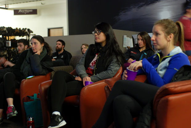 Students watch previews of the films featured in the Banff Mountain Film Festival tour at the outdoor recreation center Thursday Jan. 15, 2015.