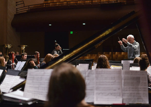 Ray Cramer directs WSU’s Symphonic Band and Wind Ensemble in Bryan Hall Theatre on Monday, Feb. 9, 2015.
