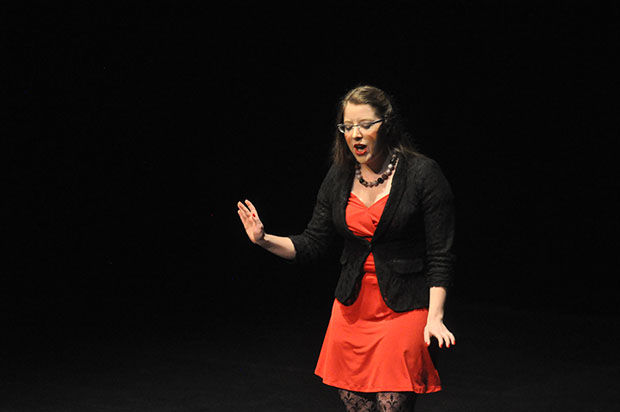 A student performs on stage during a production of The Vagina Monologues, Jan. 11, 2012.