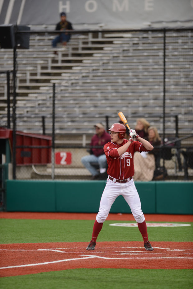 WSU sophomore outfielder Cooper Elliot sets up for the pitch during a game against Texas State in Bailey-Brayton Field, Mar. 8, 2014.