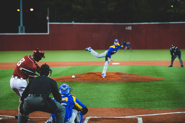 WSU freshman Wes Hatten swings at a pitch against UC Riverside at Bailey-Brayton Field, Thursday, Feb. 26, 2015.