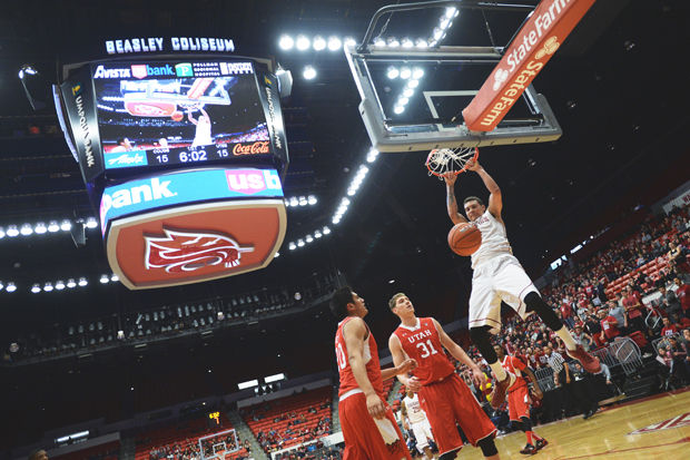 WSU senior center Jordan Railey dunks against Utah at Beasley Coliseum, Thursday, March 5, 2015.