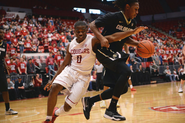 WSU sophomore guard Ike Iroegbu attempts to steal the ball against Colorado at Beasley Coliseum, Saturday, March 7, 2015.