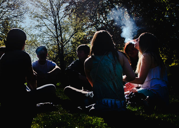 Recreational smokers sit in a circle in Moscow, Idaho during Hemp Fest, Saturday, April 18, 2015.