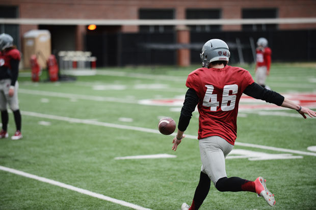 WSU sophomore Erik Powell punts during practice at Rogers Field, March 31, 2015.