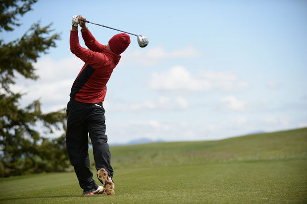 A WSU golfer tees off during the Pac-12 Championships at Palouse Ridge Golf Course, Wednesday, April 29, 2015.