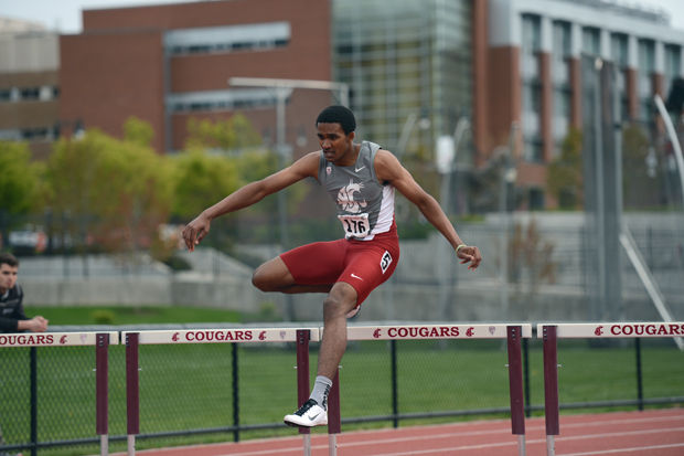 WSU redshirt freshman hurdler Abu Kamara runs in the Men’s 110 meter hurdles during the Cougar Invitational on Mooberry Track & Field, Saturday, April 25, 2015.