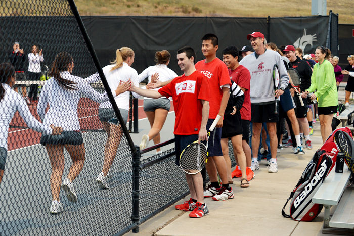 The+WSU+women%E2%80%99s+tennis+team+gives+high+fives+to+the+attendees+of+the+social+event+they+held+on+Friday%2C+Sept.+4.