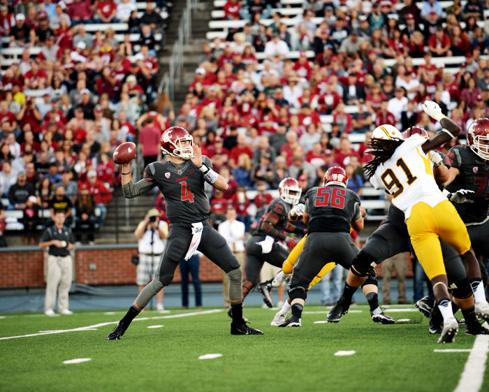 Redshirt+sophomore+Luke+Falk+drops+back+to+pass+during+a+game+against+Wyoming+in+Martin+Stadium%2C+Sept.+19%2C+2015.