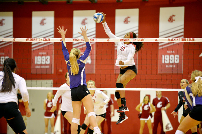 Freshman+middle+blocker+Taylor+Mims+spikes+the+ball+against+Washington+during+a+match+in+Bohler+Gym%2C+Sept.+24%2C+2015.