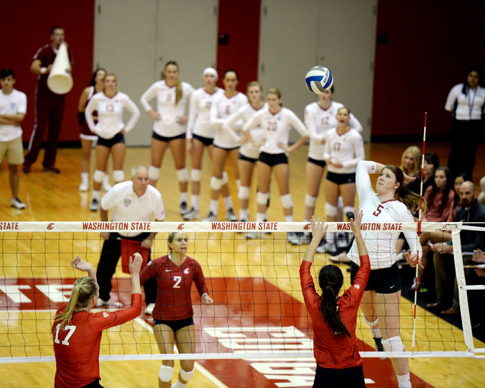 Freshman+McKenna+Woodford+spikes+the+ball+during+a+match+against+Utah+in+Bohler+Gym%2C+Sept.+26%2C+2015.
