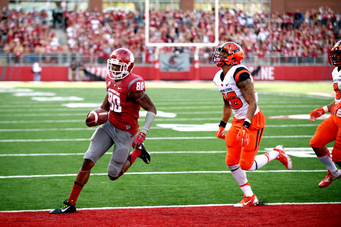 Redshirt senior wide receiver Dom Williams runs into the endzone for a touchdown after catching a pass from redshirt sophomore quarterback Luke Falk during a game against Oregon State in Martin Stadium, Oct. 17, 2015.