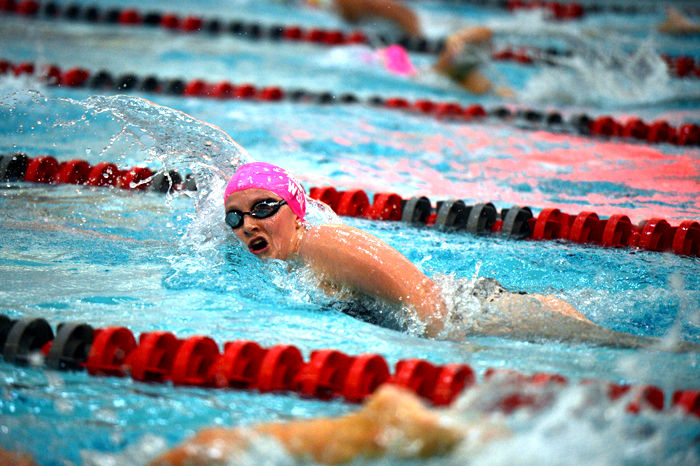 A WSU swimmer performs freestyle during a heat against California in Gibb Pool, Oct. 9, 2015.