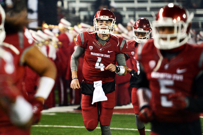 Redshirt+sophomore+quarterback+Luke+Falk+runs+out+of+the+tunnel+prior+to+the+game+against+Stanford+in+Martin+Stadium%2C+Oct.+31%2C+2015.