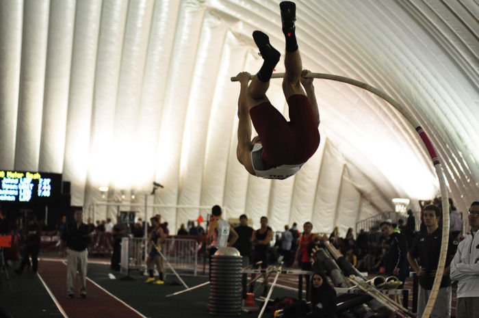 A WSU pole vaulter propels himself into the air during the WSU Indoor Open, Jan. 23, 2015.