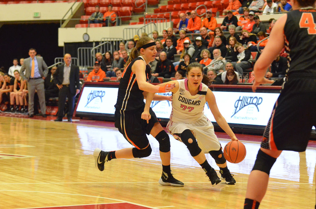 Sophomore guard Pinelopi Pavlopoulou dribbles around an Oregon State player during a game against the Beavers at Beasley Coliseum on Sunday.