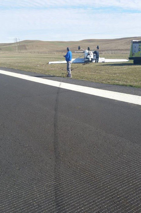 The totaled plane next to the runway at the Pullman-Moscow Regional Airport.