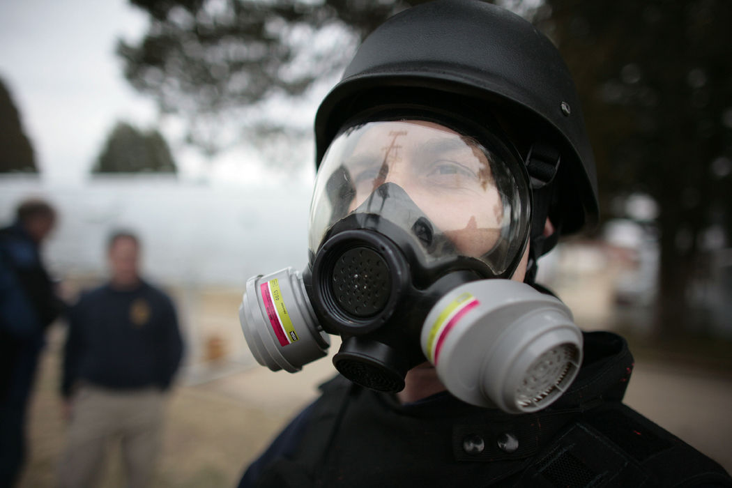 Rep. Rick Larsen (D-WA) experiences the DEA training curriculum on Clandestine Laboratories in this mock meth lab in Quantico, Virginia,  Feb. 12, 2007. Over the past 20 years, more than 12,000 mostly state and local law enforcement officers have taken the week-long DEA course on raiding and securing a meth lab.