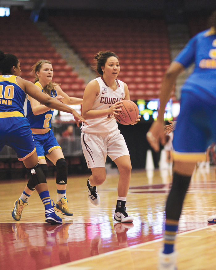 Senior guard Dawnyelle Awa dribbles the ball down the court during a game against UCLA at Beasley Coliseum on Jan. 15.